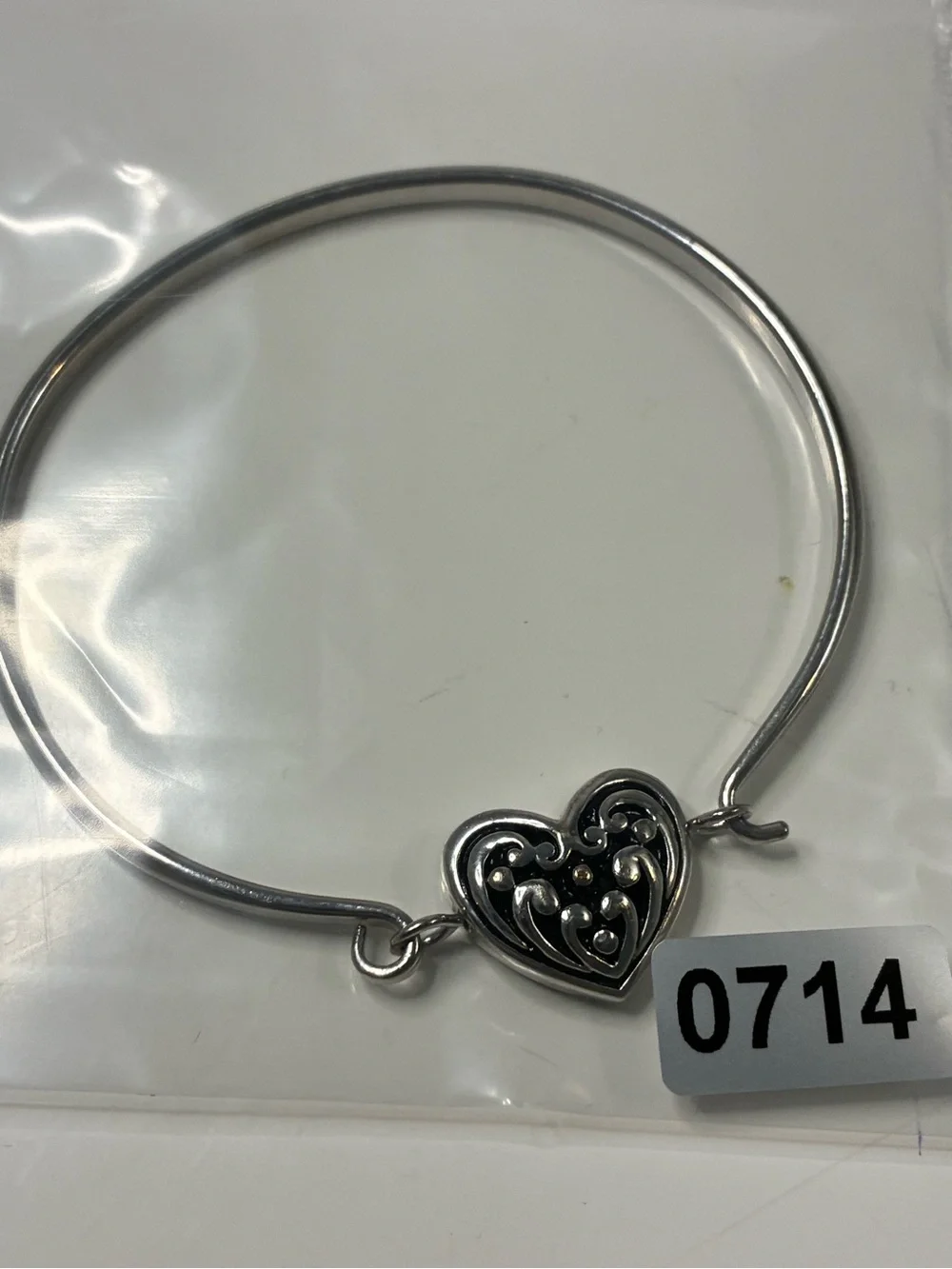 Source Unknown polished silver